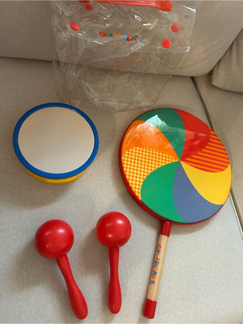 5 pc kids toy set. Tambourine, handheld drum, 2 shaker Moroccans. Carrying bag